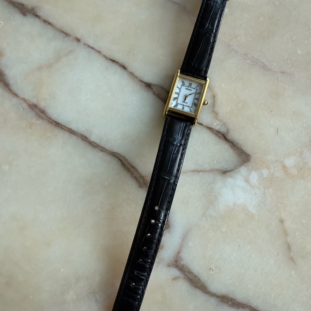 Seiko Solar Women V115-0BD0 White Dial Black Leather Quartz Tank Watch 6 1/4"